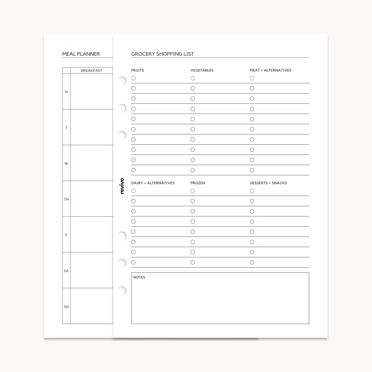 Open planner displaying a meal planner page alongside a grocery shopping list, with clear sections for categorized items such as fruits, vegetables, and pantry essentials.